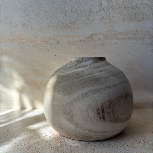 Vase en bois-rond