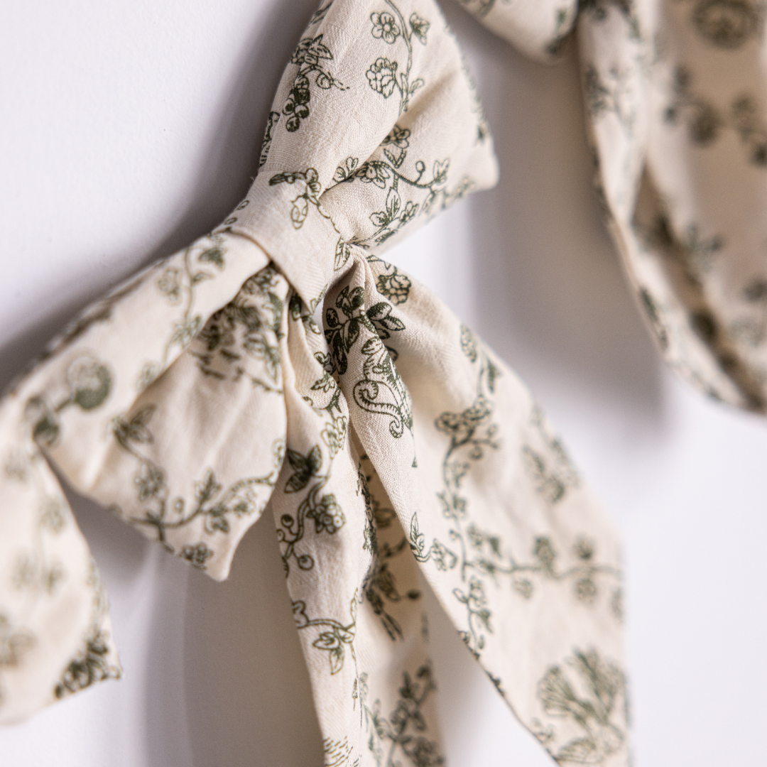 Guirlande de nœuds en tissu « toile de jardin » verte